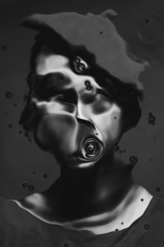 A black and white photo of a man's face