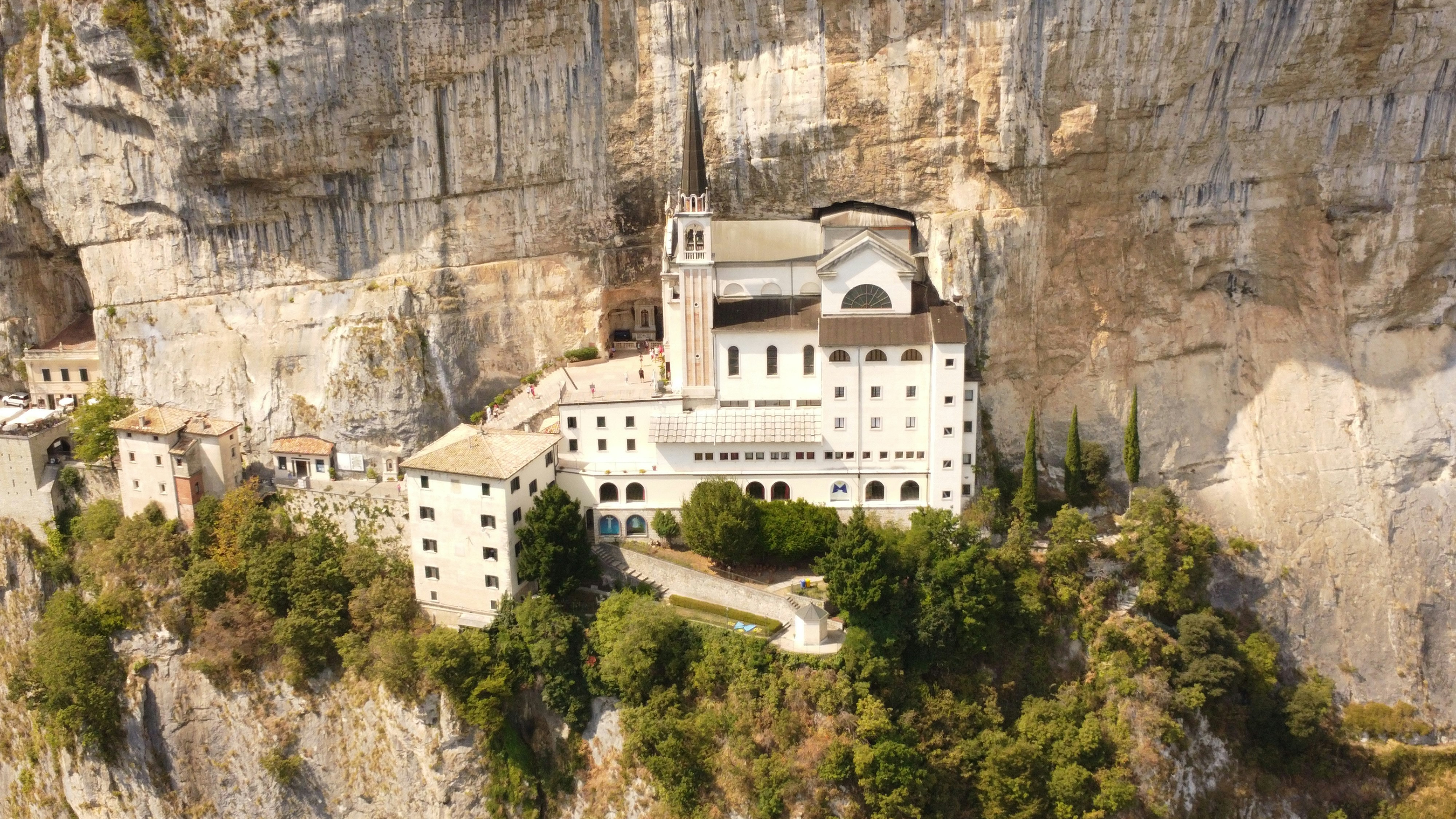 An aerial view of a building on a cliff