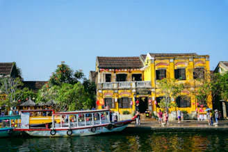 A group of boats that are sitting in the water