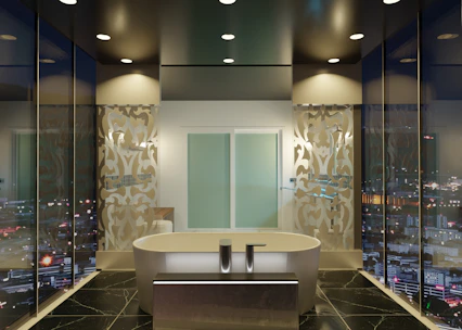 A bathroom with a tub and a large window