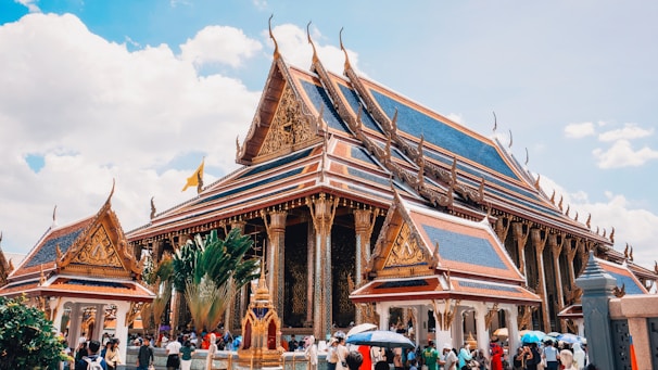 A group of people standing in front of a building