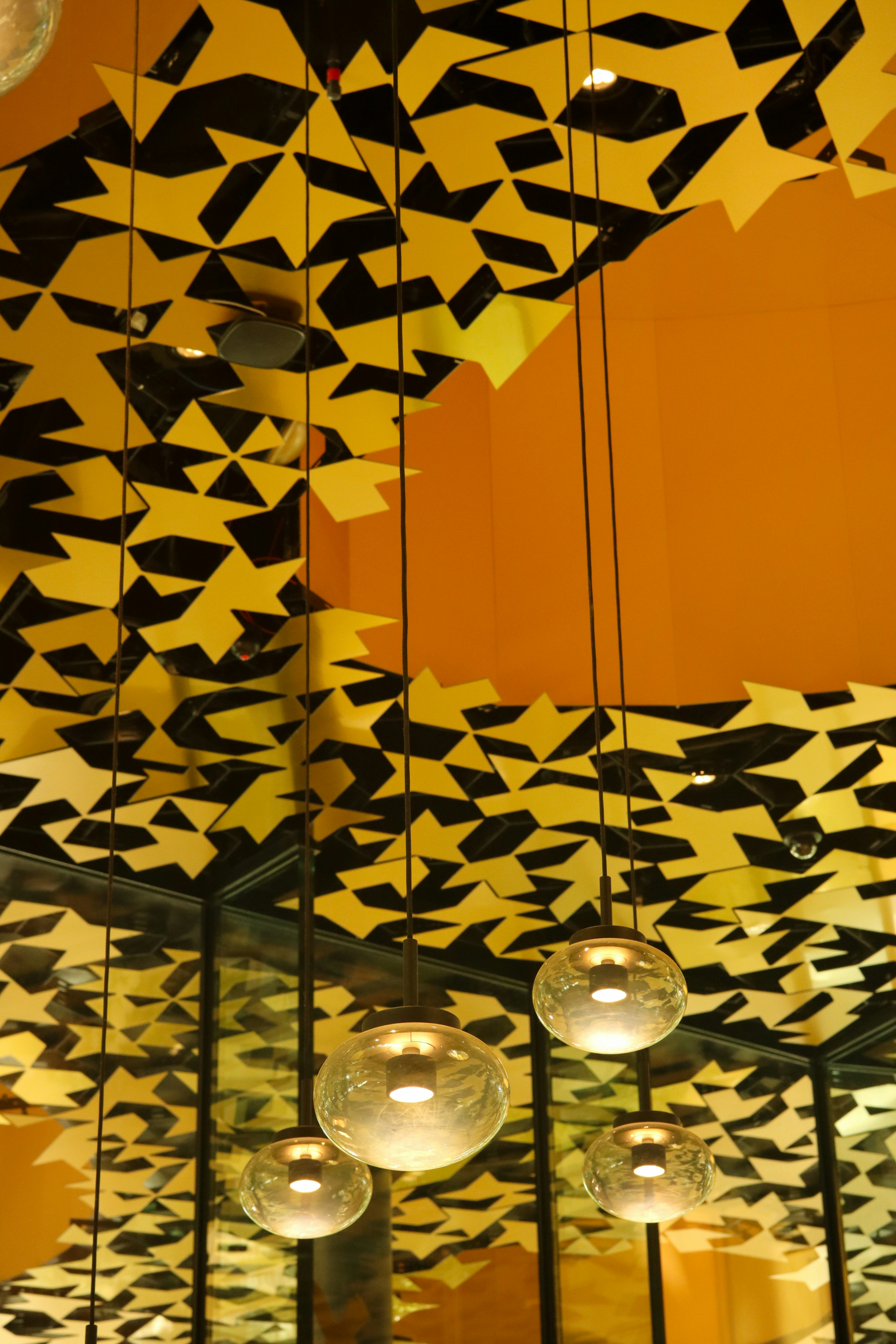 A room filled with lots of hanging lights