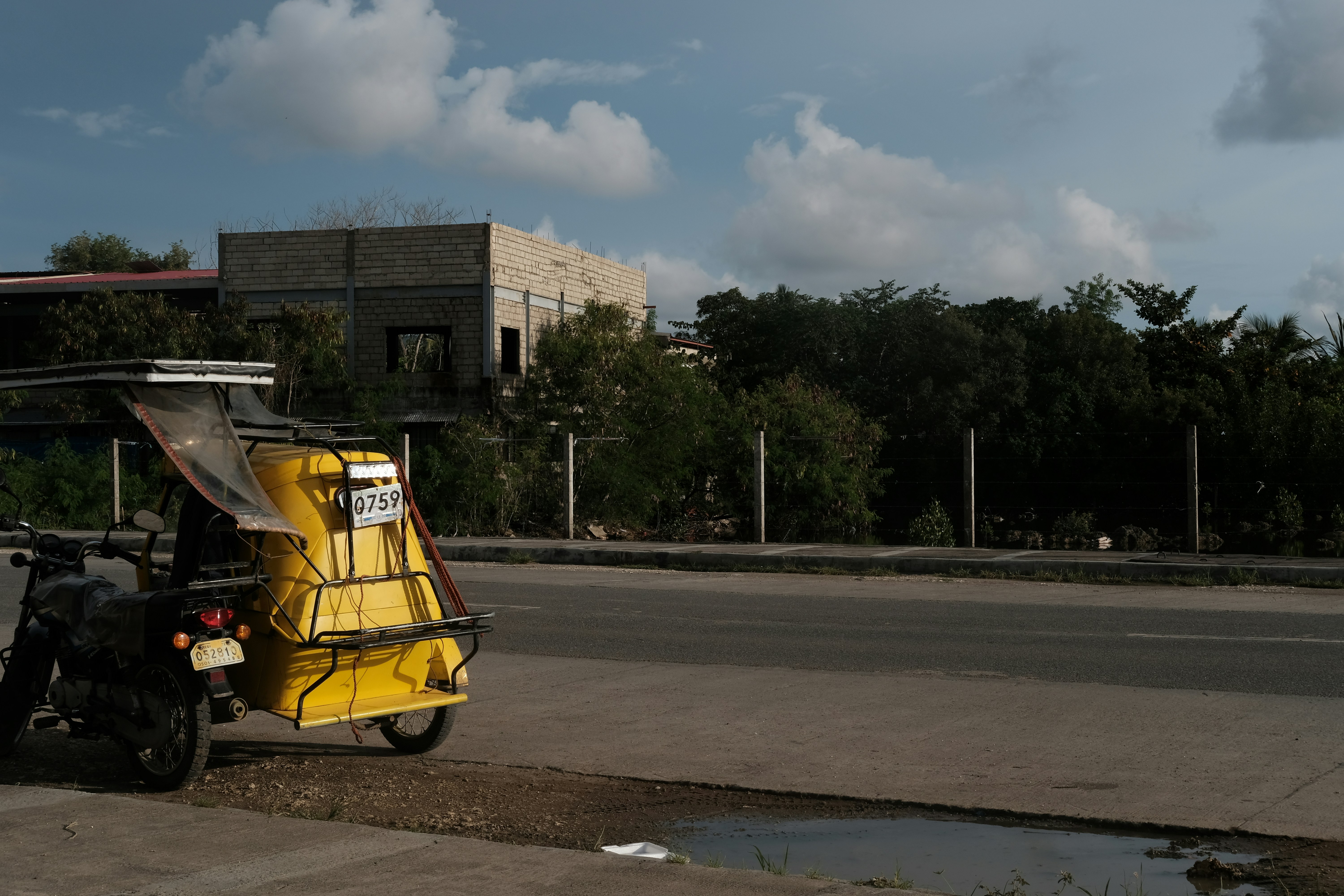 A motorcycle parked on the side of the road