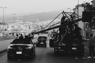 A black and white photo of a city street