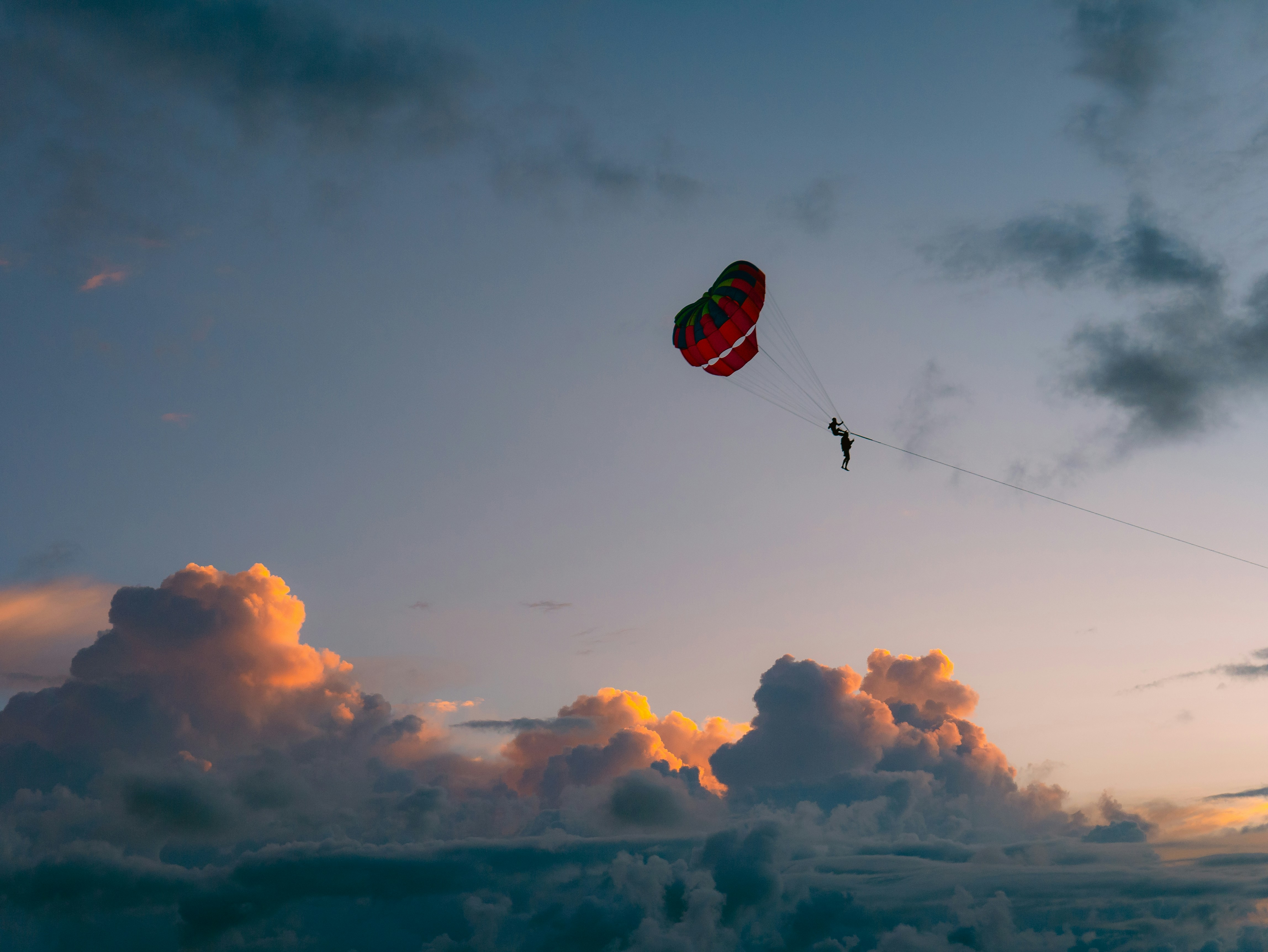 A person is flying a kite in the sky, 