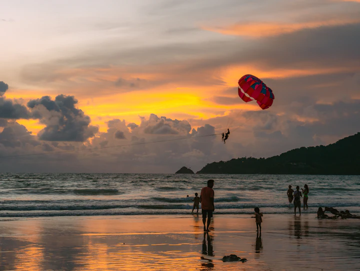 Sunset and parasail over Patong Beach, Phuket