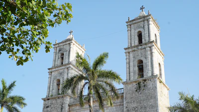 The white twin-towered church of San Servacio on the plaza in Valladolid