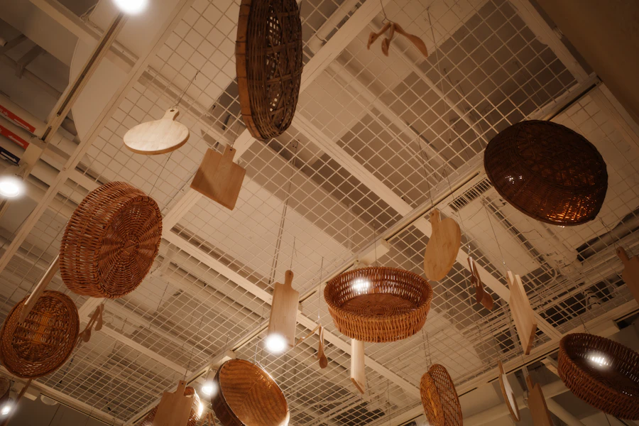 Wooden bowls hanging from the ceiling of a workshop