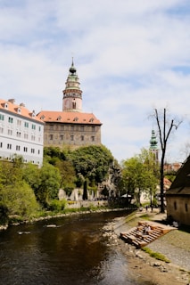 A river running through a city next to tall buildings