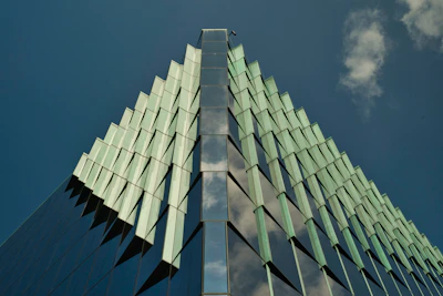 A very tall building with a sky in the background