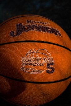 A close up of a basketball on a court