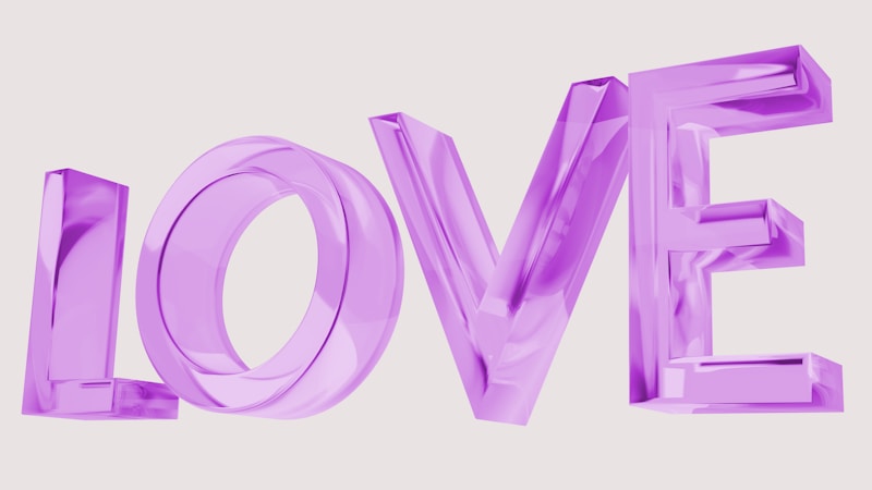 The word love is made up of shiny purple letters