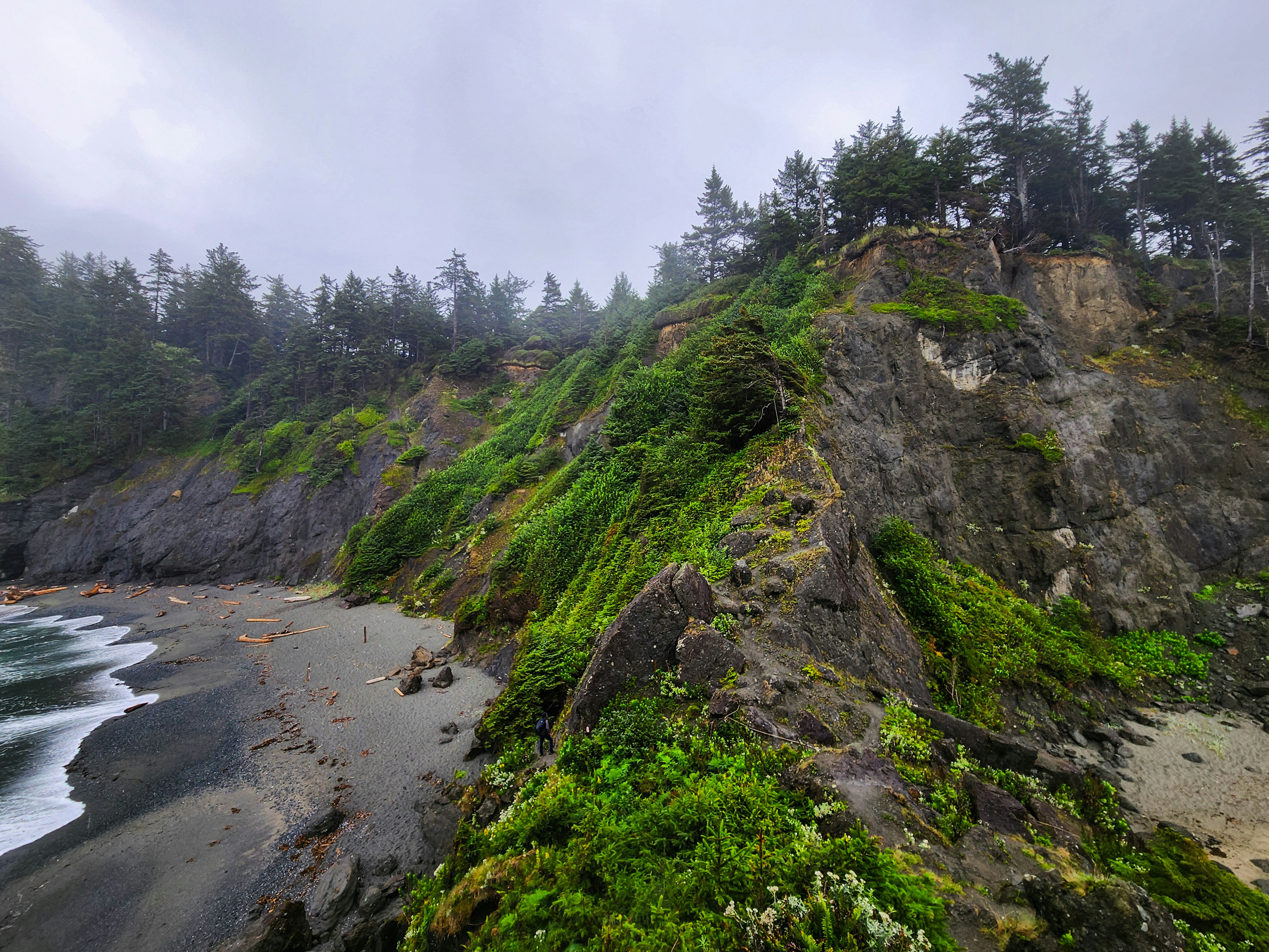 Shi Shi Beach, located in Olympic National Park on Washington’s remote Pacific coastline, is renowned for its rugged beauty, dramatic sea stacks, and tide pools teeming with marine life. Accessible by a scenic hike through lush forest, the beach features stunning rock formations like Point of Arches and offers visitors the chance to witness pristine wilderness and breathtaking sunsets. Shi Shi Beach is part of the protected coastal wilderness, making it a popular destination for hikers, photographers, and nature lovers seeking solitude and natural beauty.