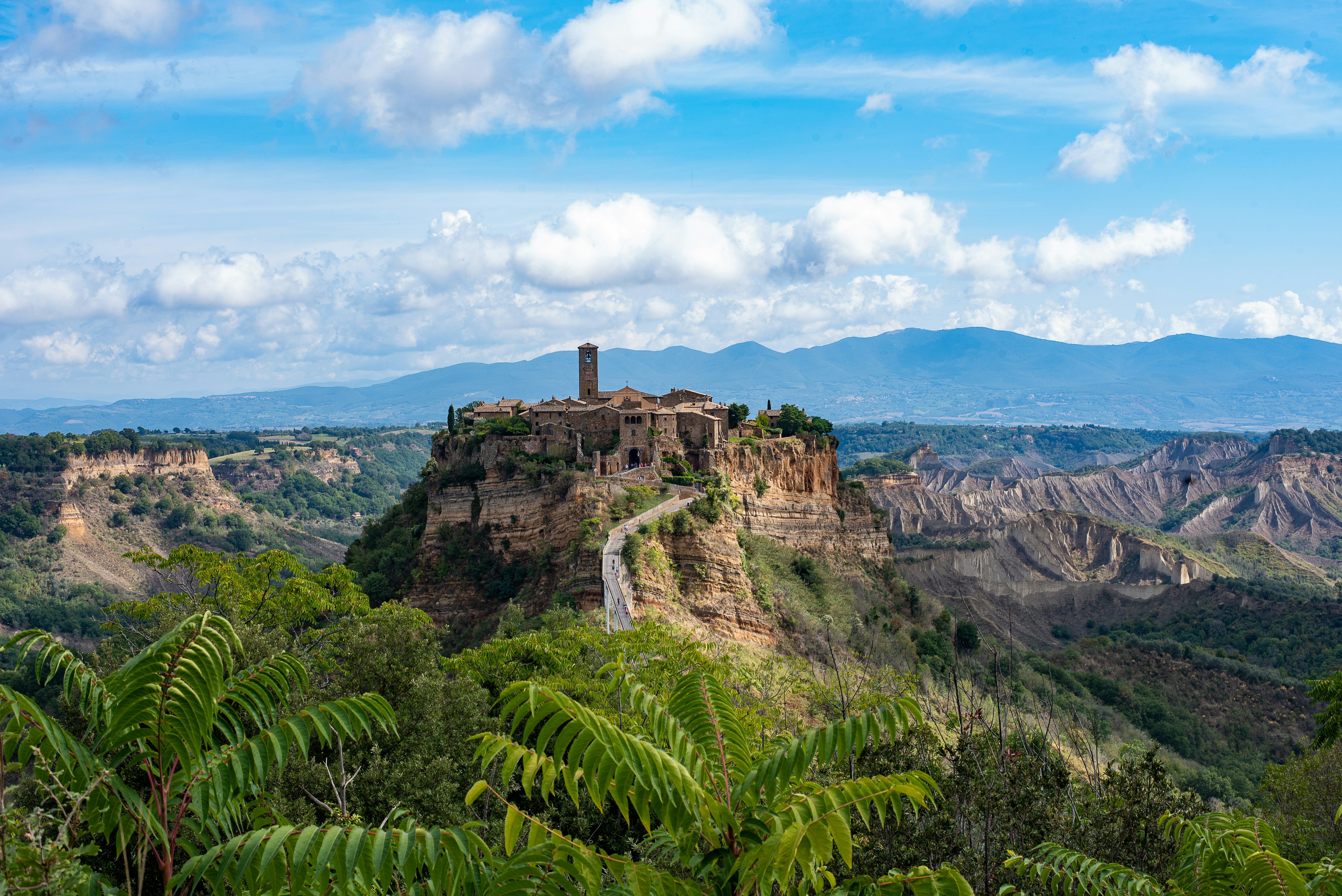 A view of a mountain with a castle on top of it