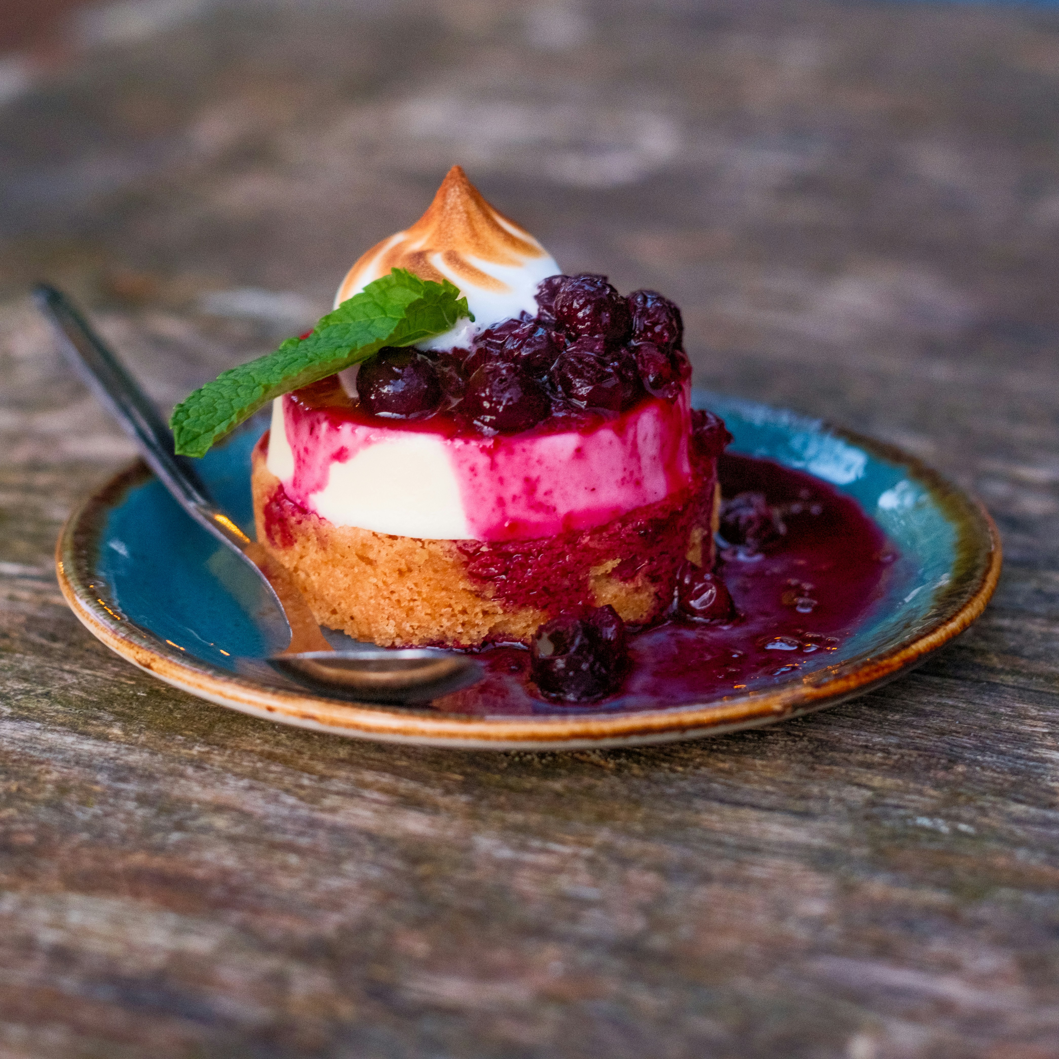 A small dessert on a plate with a fork