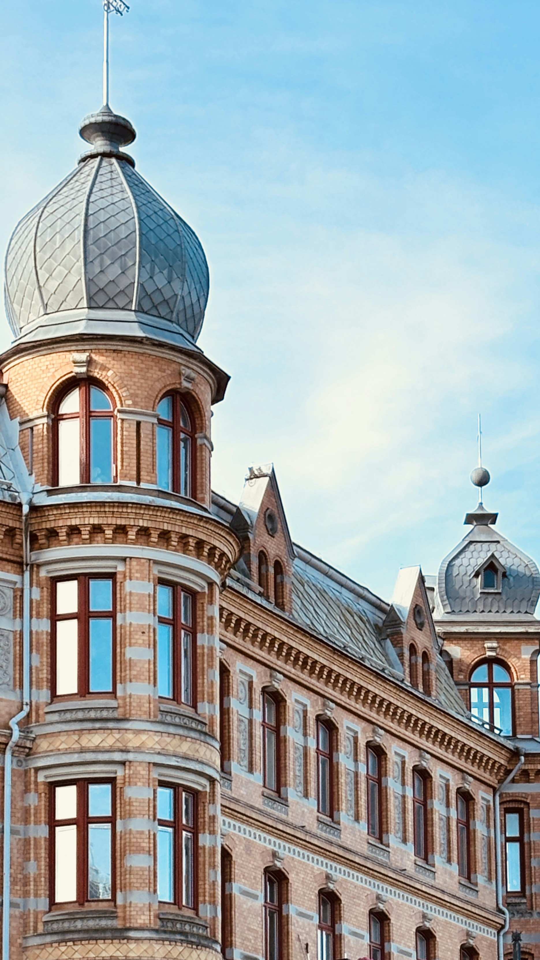 A large building with a flag on top of it