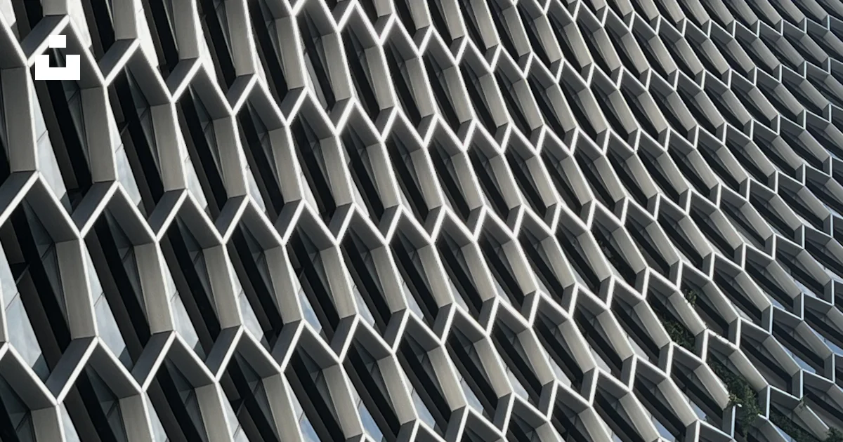 A close up of a building with a lot of windows photo – Free Texture ...