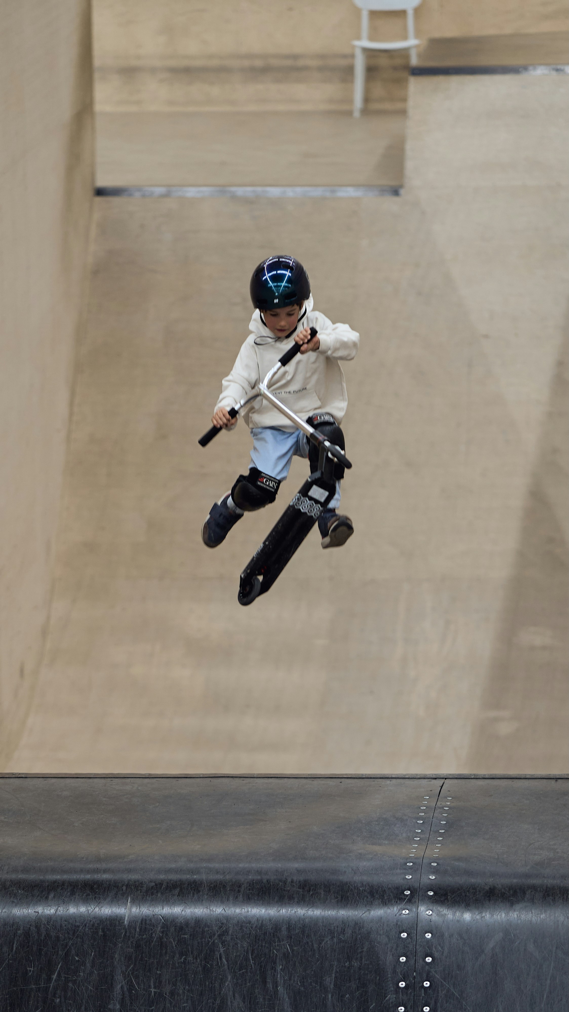 A man flying through the air while riding a skateboard