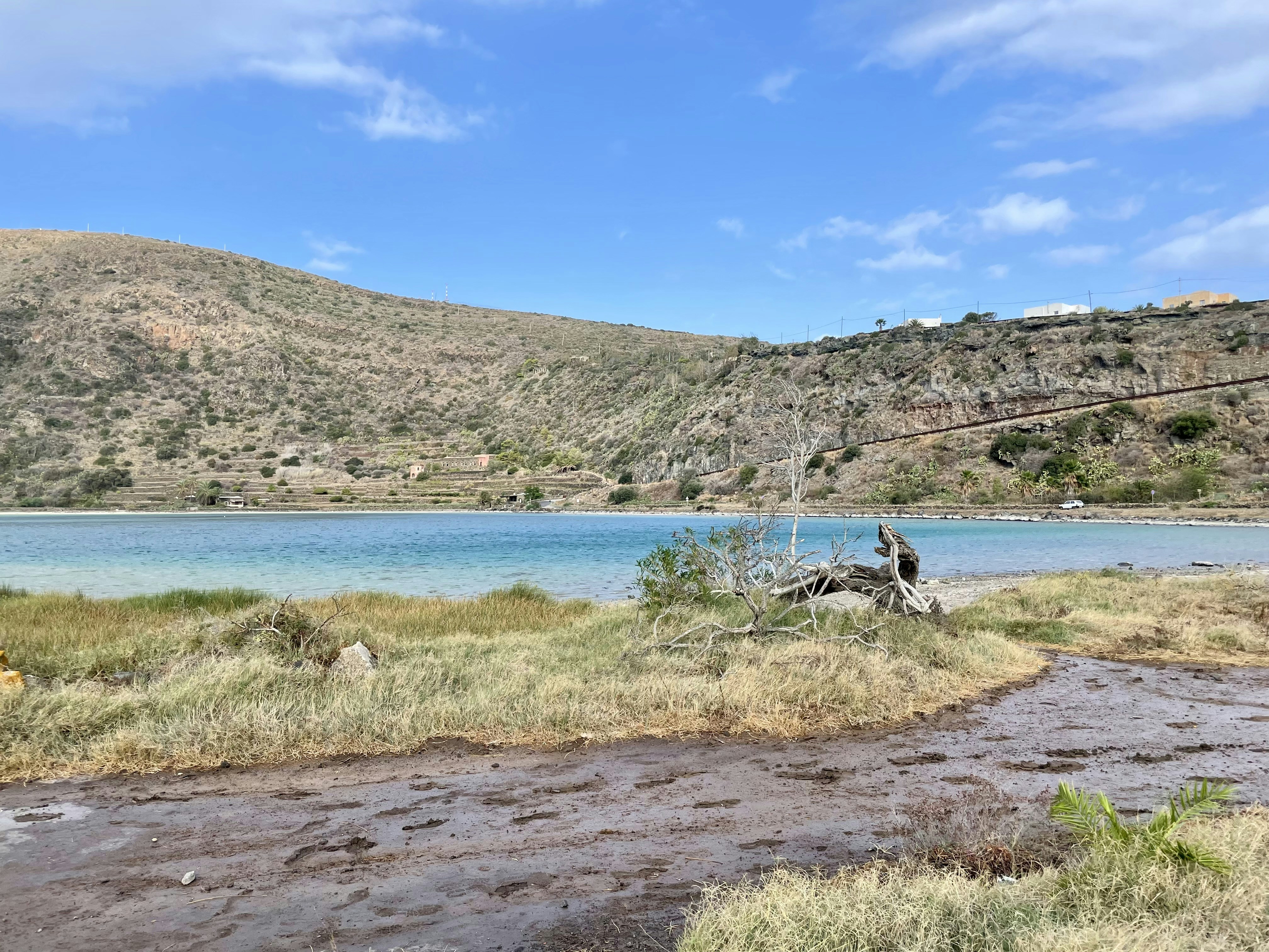 A large body of water surrounded by mountains