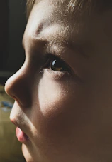 A close up of a young child's face