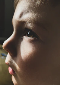 A close up of a young child's face