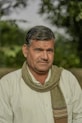 A man with a scarf around his neck
