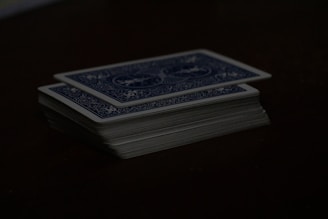 A stack of cards sitting on top of a table