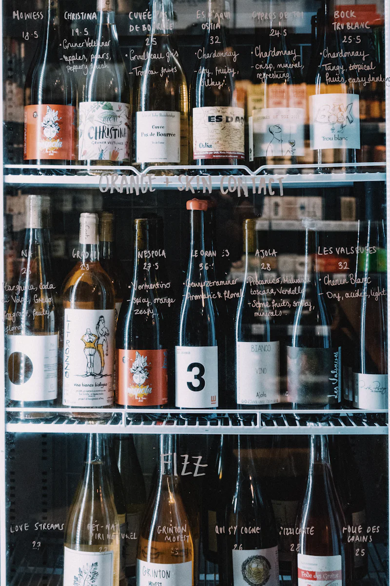 Wine fridge filled with wine bottles