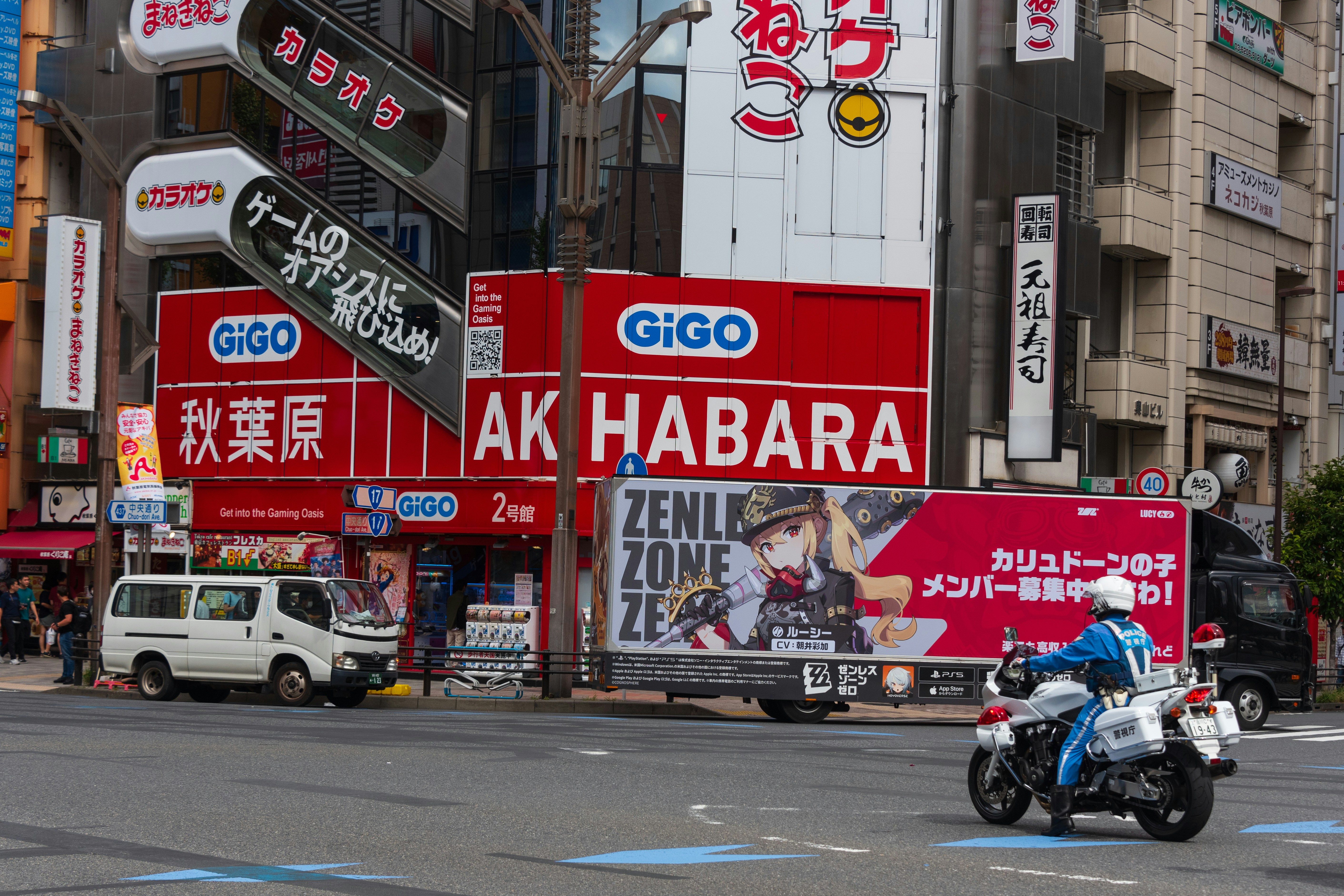 Akihabara side street with small, cluttered shop entrances and signs