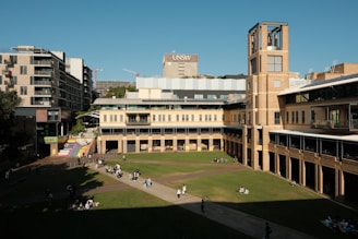 A large building with a clock tower in the middle of it