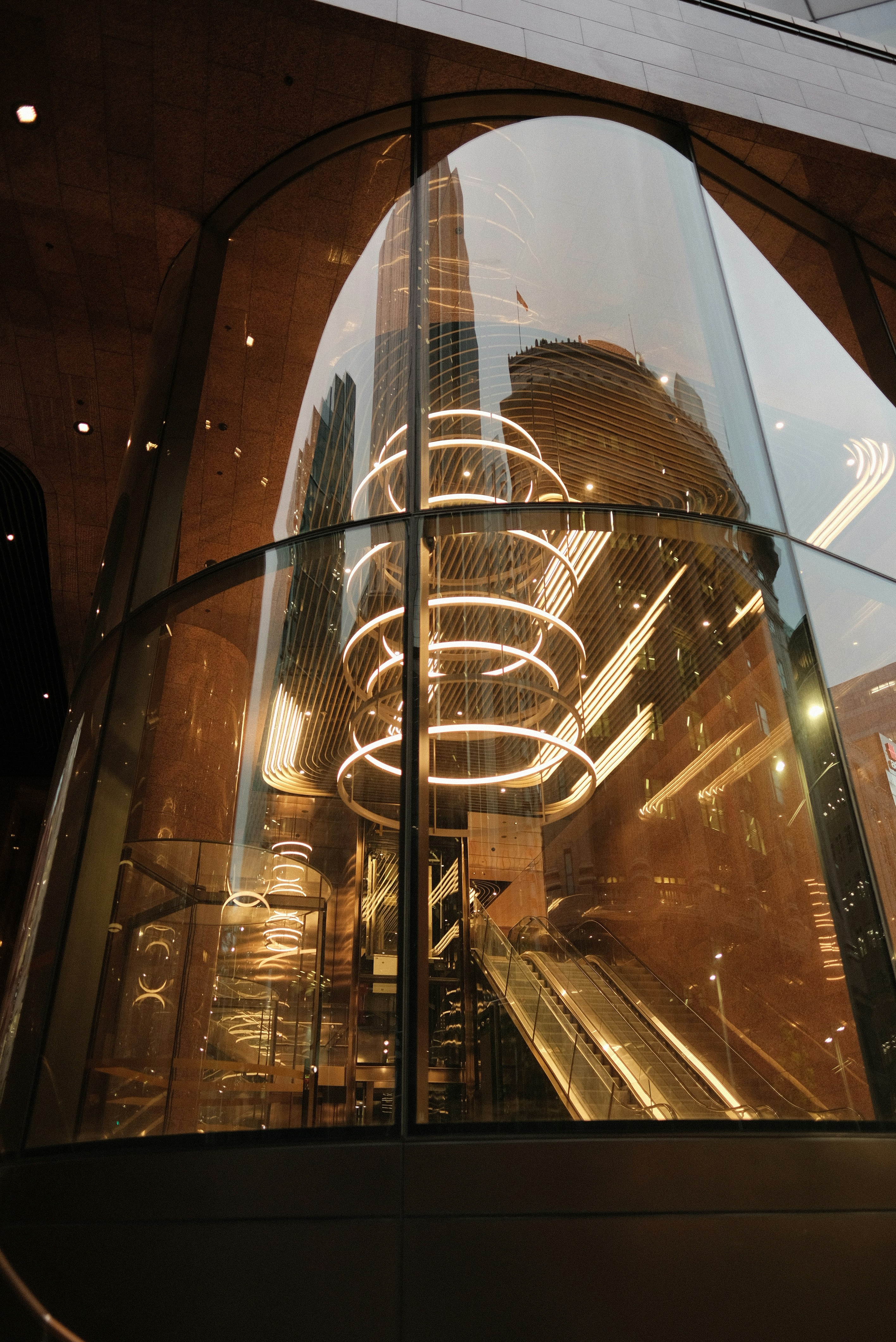 A large glass window with a building in the background