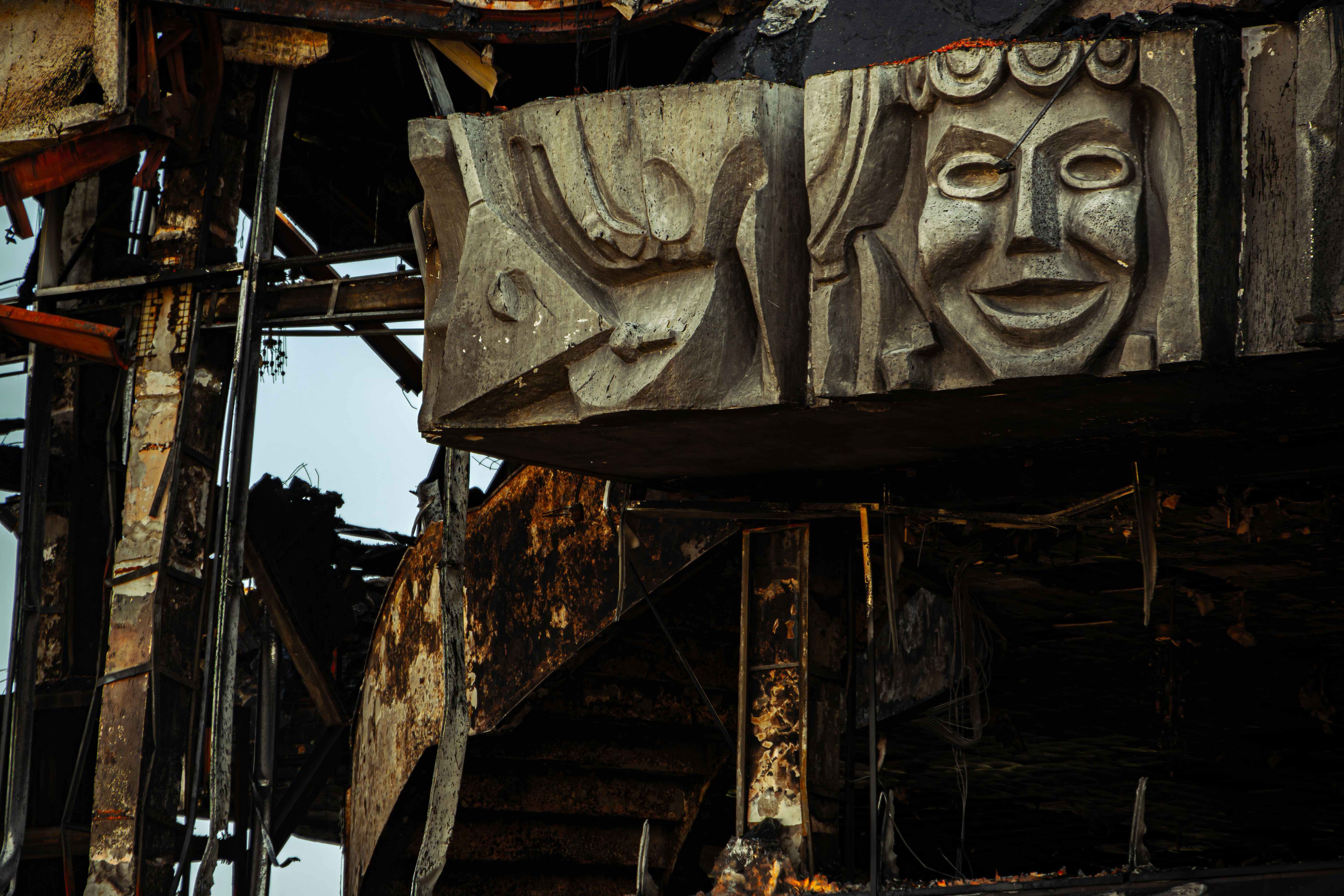 A close up of a wooden structure with a face on it