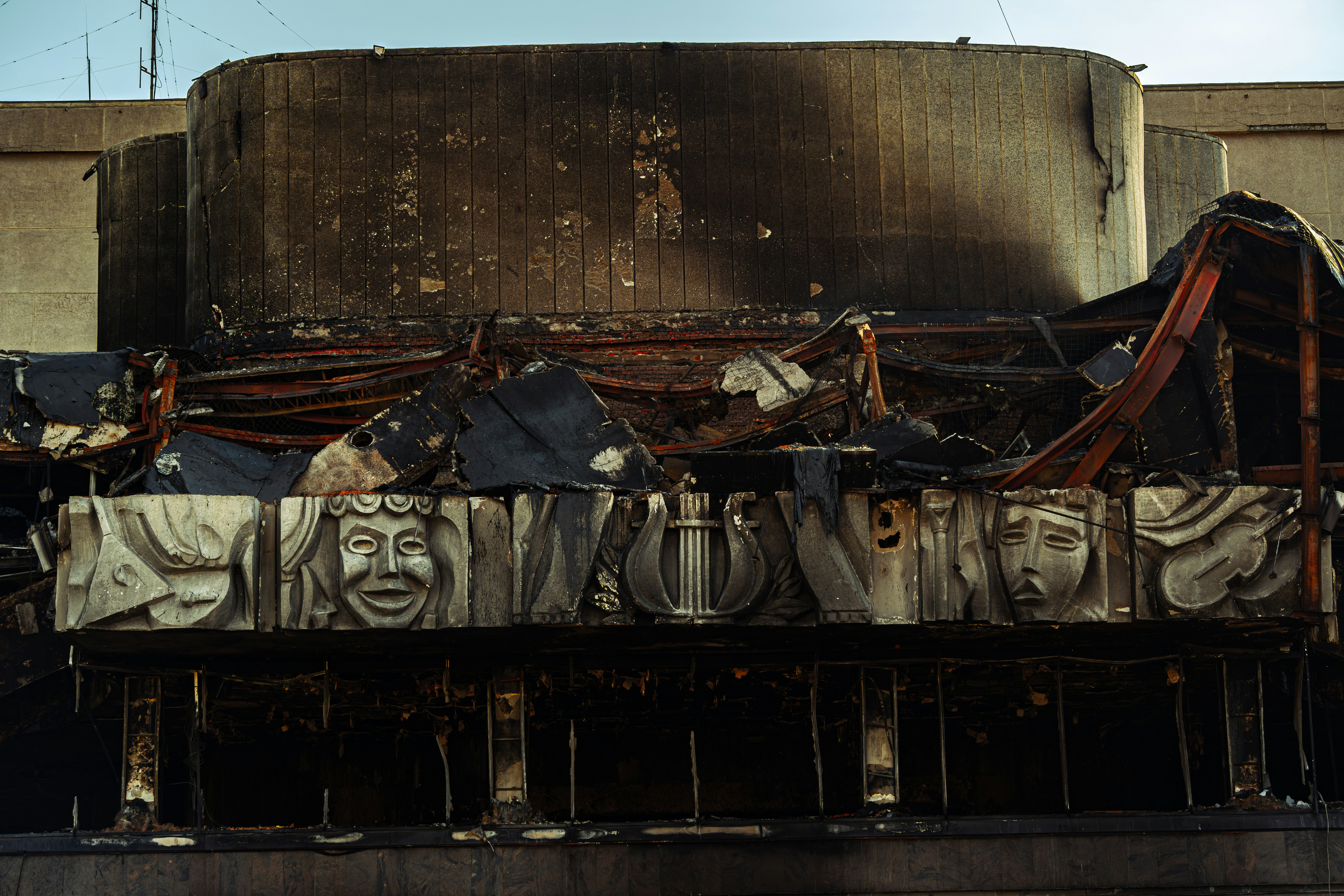 A large building with a lot of junk on top of it