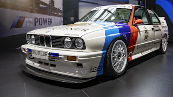 A BMW race car on display in a museum