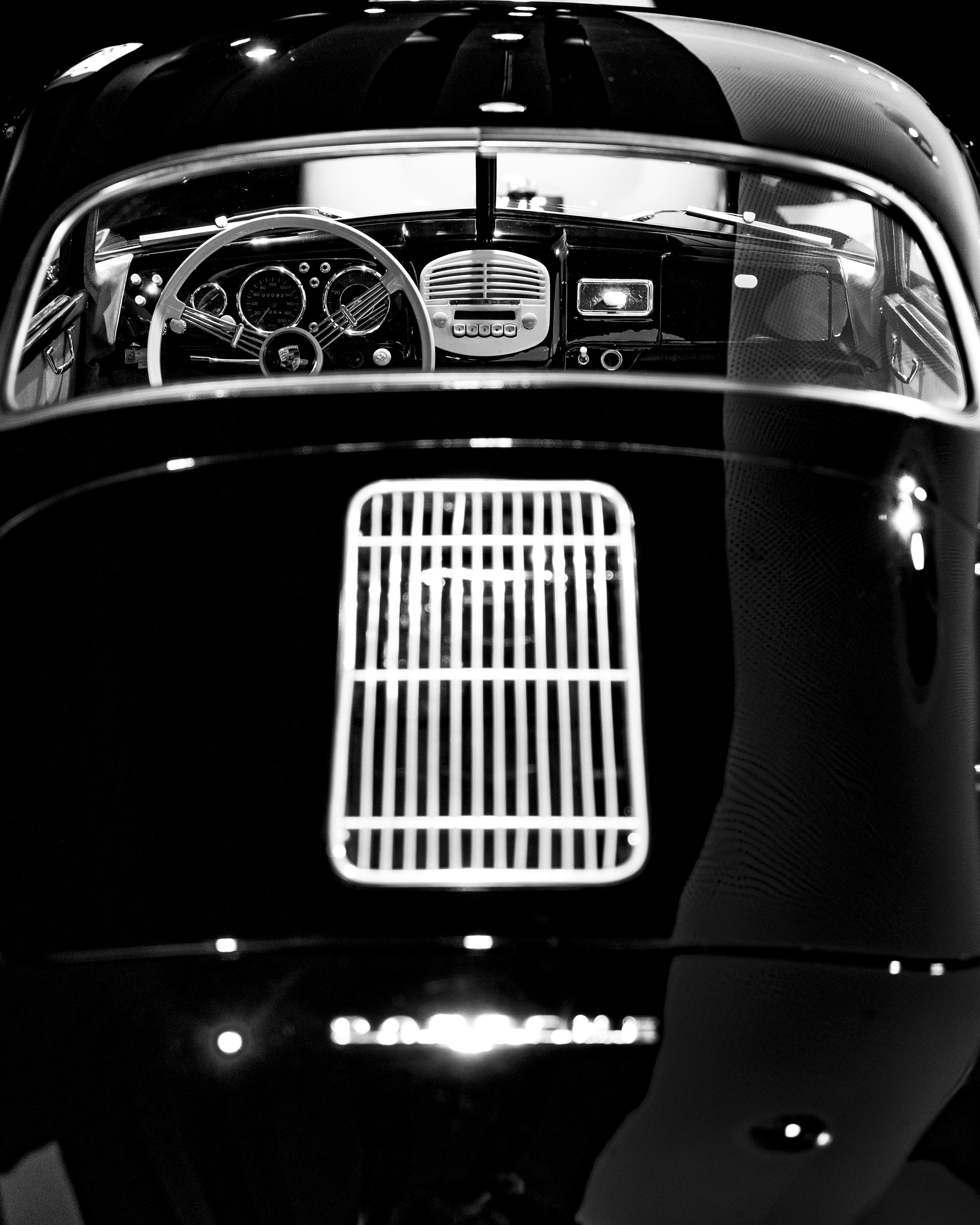 A black and white photo of a car