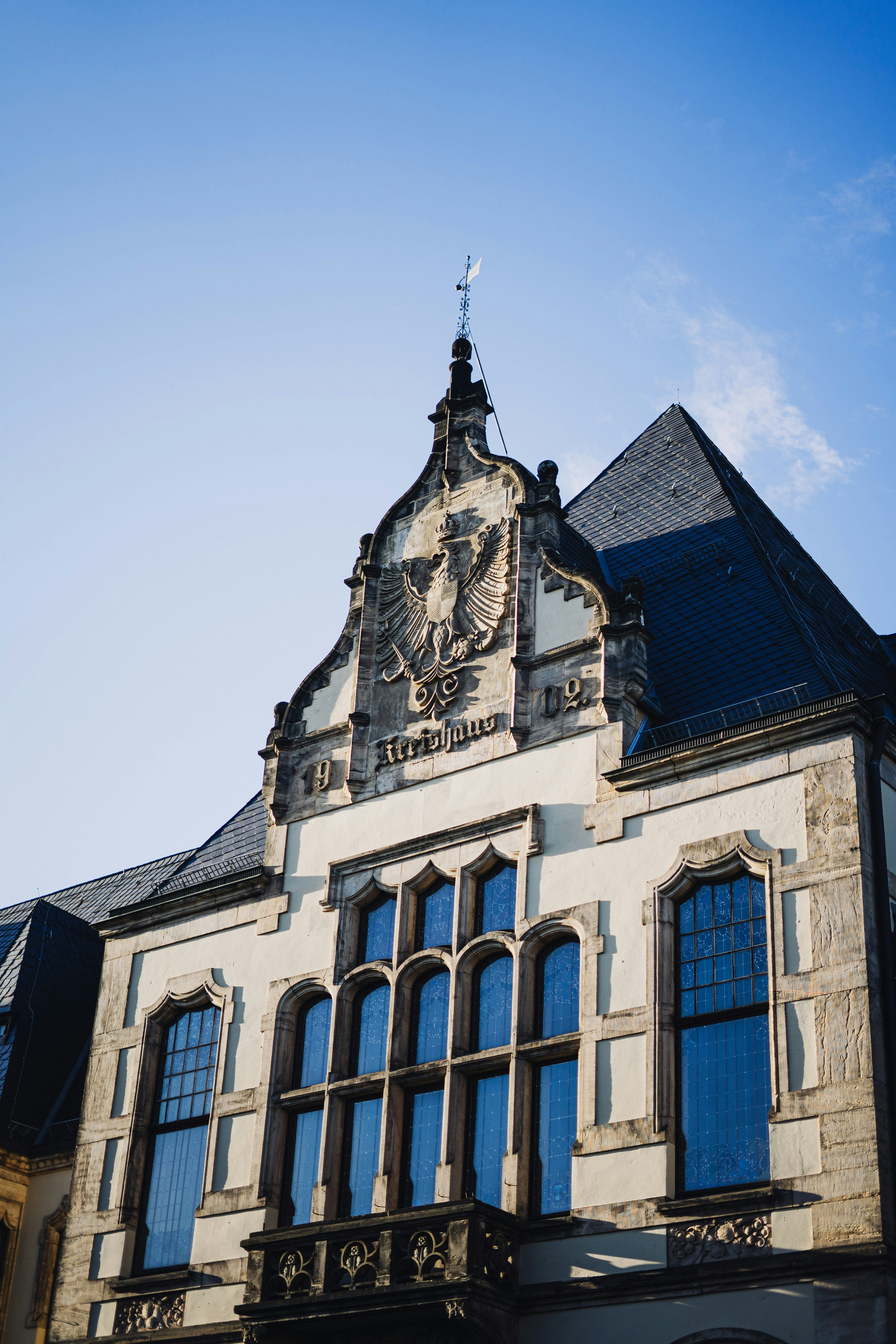 A large building with a clock on the front of it