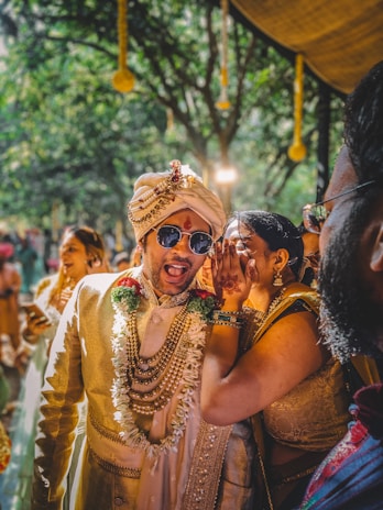 A man and woman in traditional indian garb at a wedding