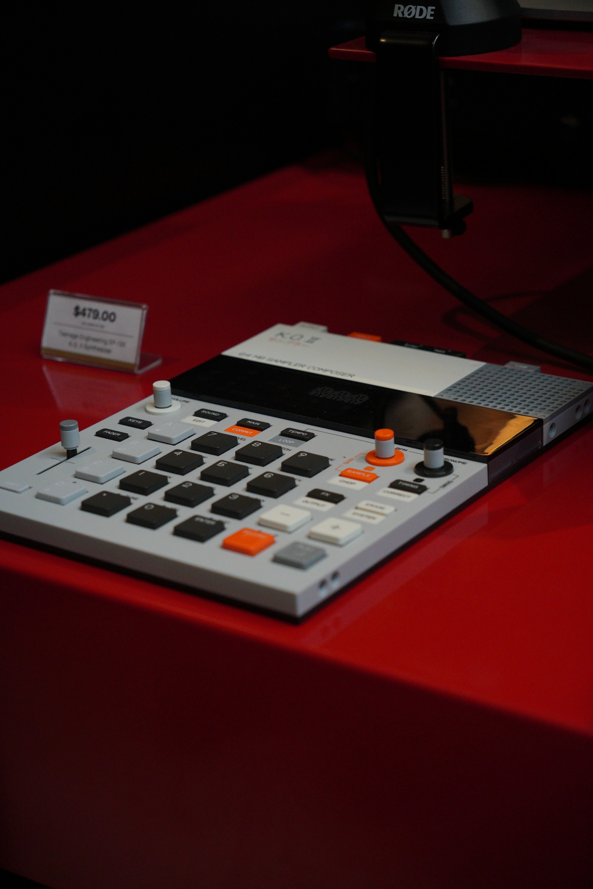 A calculator sitting on top of a red table