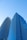 A couple of tall buildings sitting next to each other