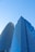 A couple of tall buildings sitting next to each other