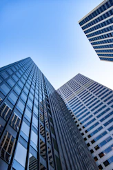 Looking up at tall buildings in a city