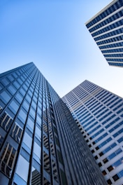 Looking up at tall buildings in a city