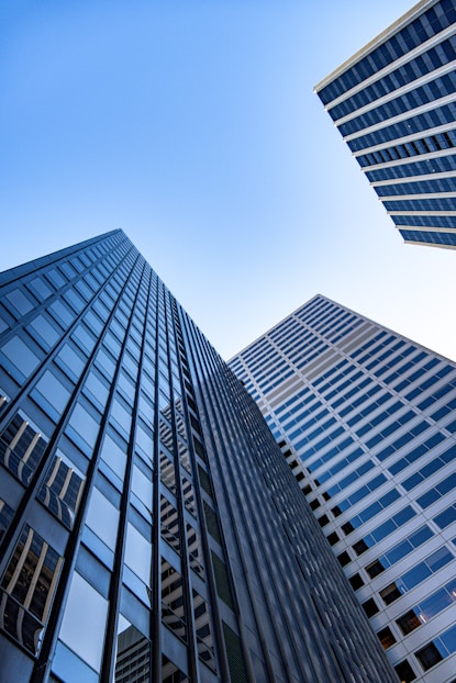 Looking up at tall buildings in a city