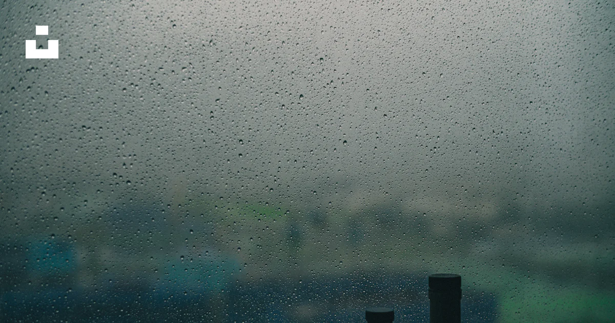 Window Sill Raining A couple of bottles sitting on top of a window sill photo – Free Rain ...