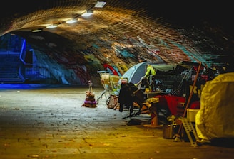 A group of tents sitting inside of a tunnel
