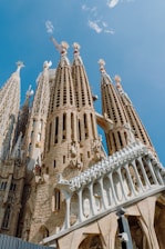 A very tall building with statues on it's sides