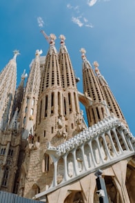 A very tall building with statues on it's sides