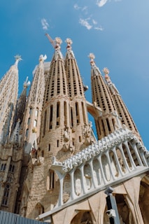 A very tall building with statues on it's sides