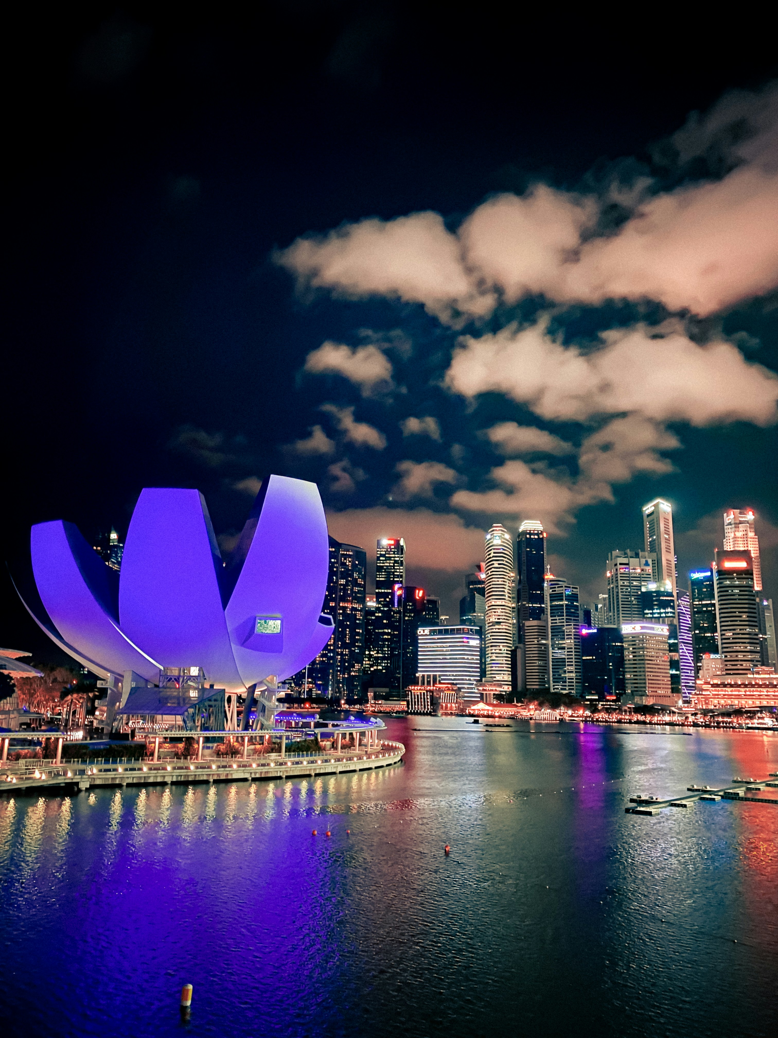 A large body of water with a city in the background