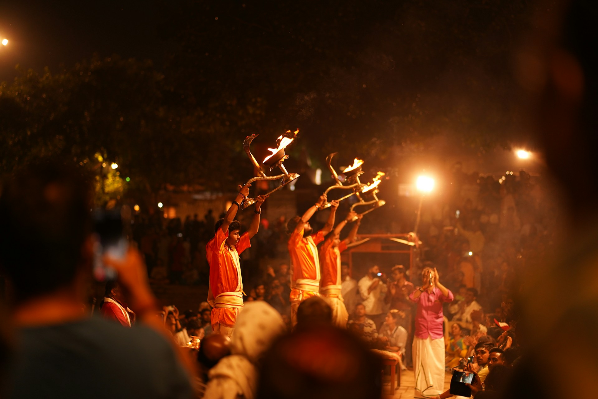 A group of people standing on top of a stage
